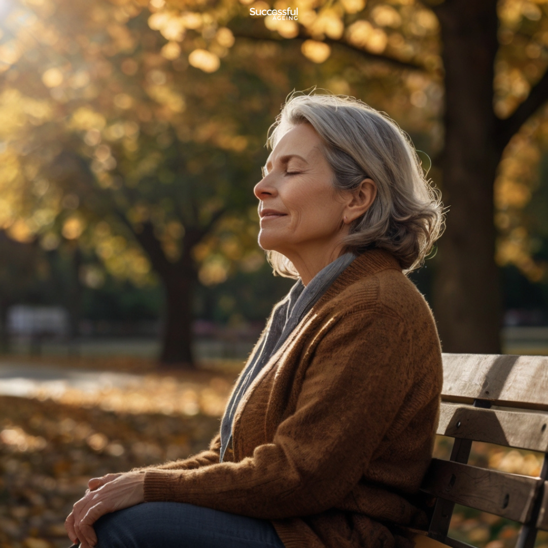 A middle-aged woman sitting peacefully on a park bench in soft afternoon light, eyes closed, exhaling deeply with a gentle smile — a moment of emotional release and relief